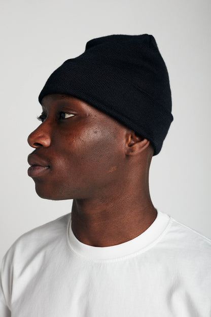 men with black beanie side profile